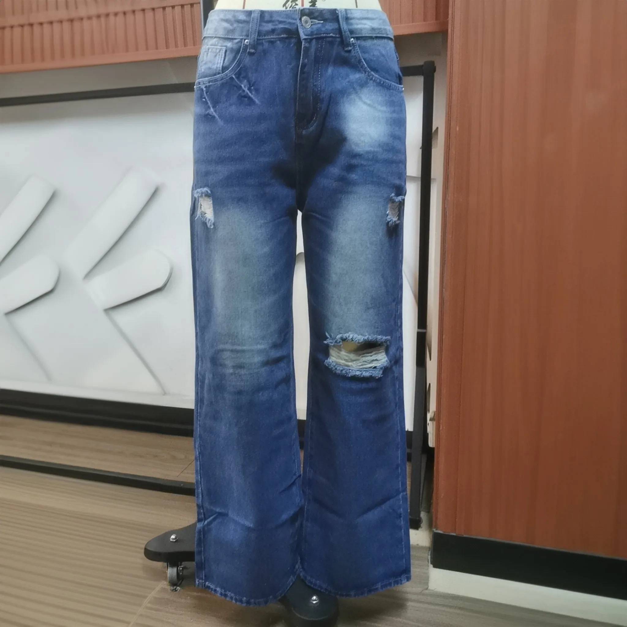 Blue ripped boot-leg jeans for women